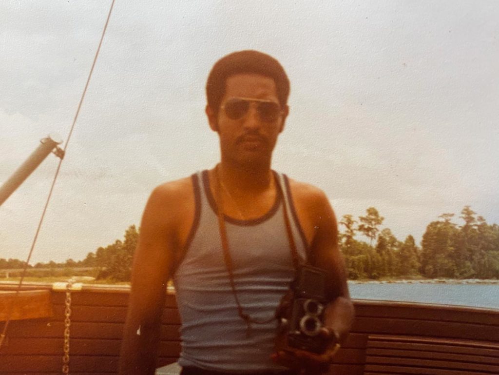 My dad holding his camera