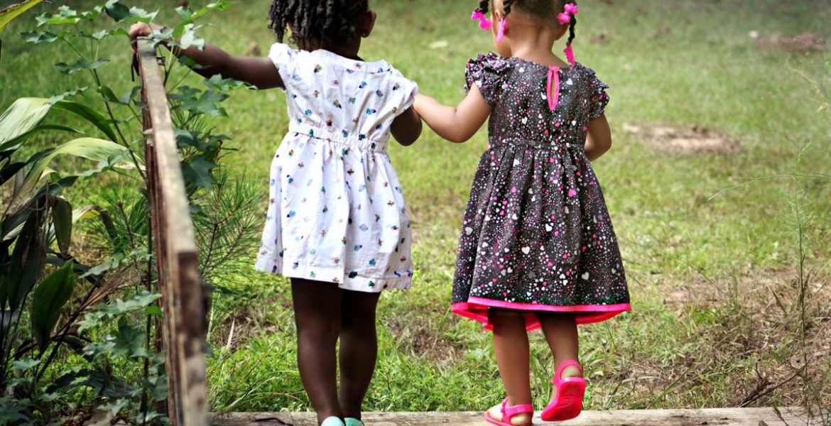 Fatherless daughters holding hands