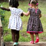 Fatherless daughters holding hands