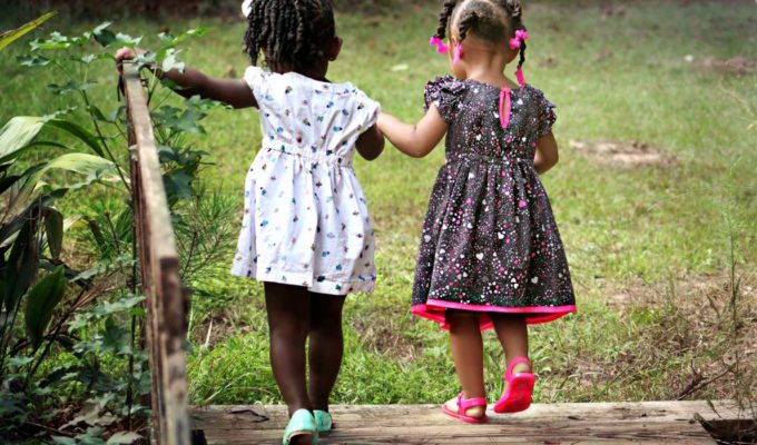 Fatherless daughters holding hands
