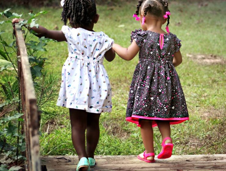 Fatherless daughters holding hands