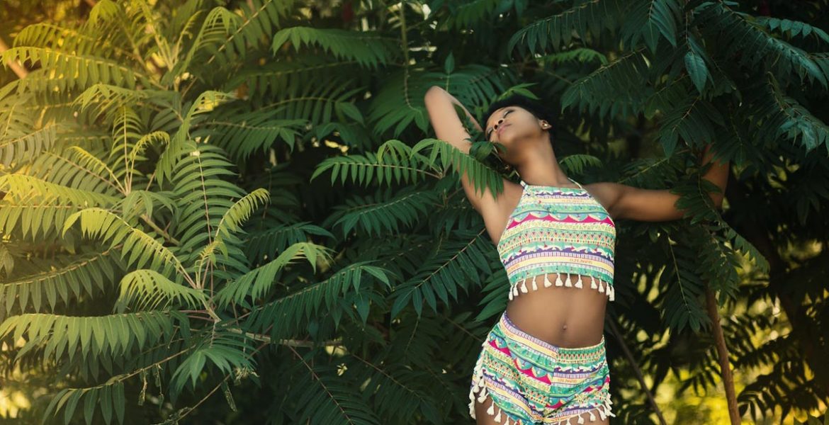 black woman exhaling in trees as esult of inner work