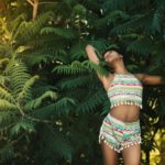 black woman exhaling in trees as esult of inner work